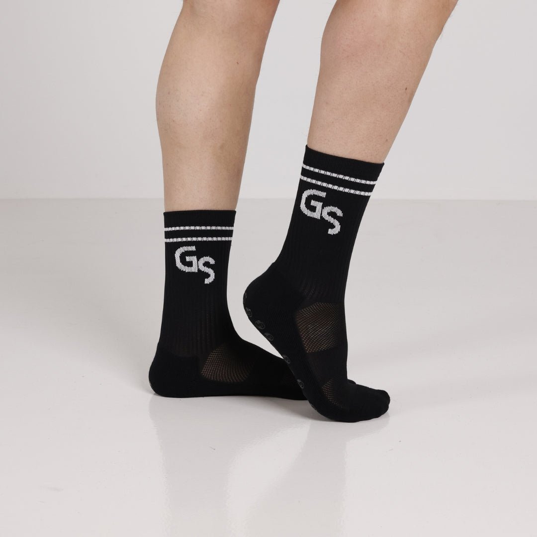 Svarte gripsokker med hvit logo - gripsocks.no