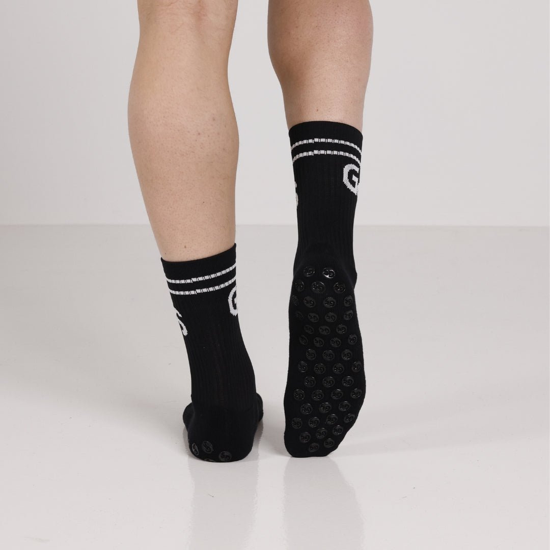 Svarte gripsokker med hvit logo - gripsocks.no